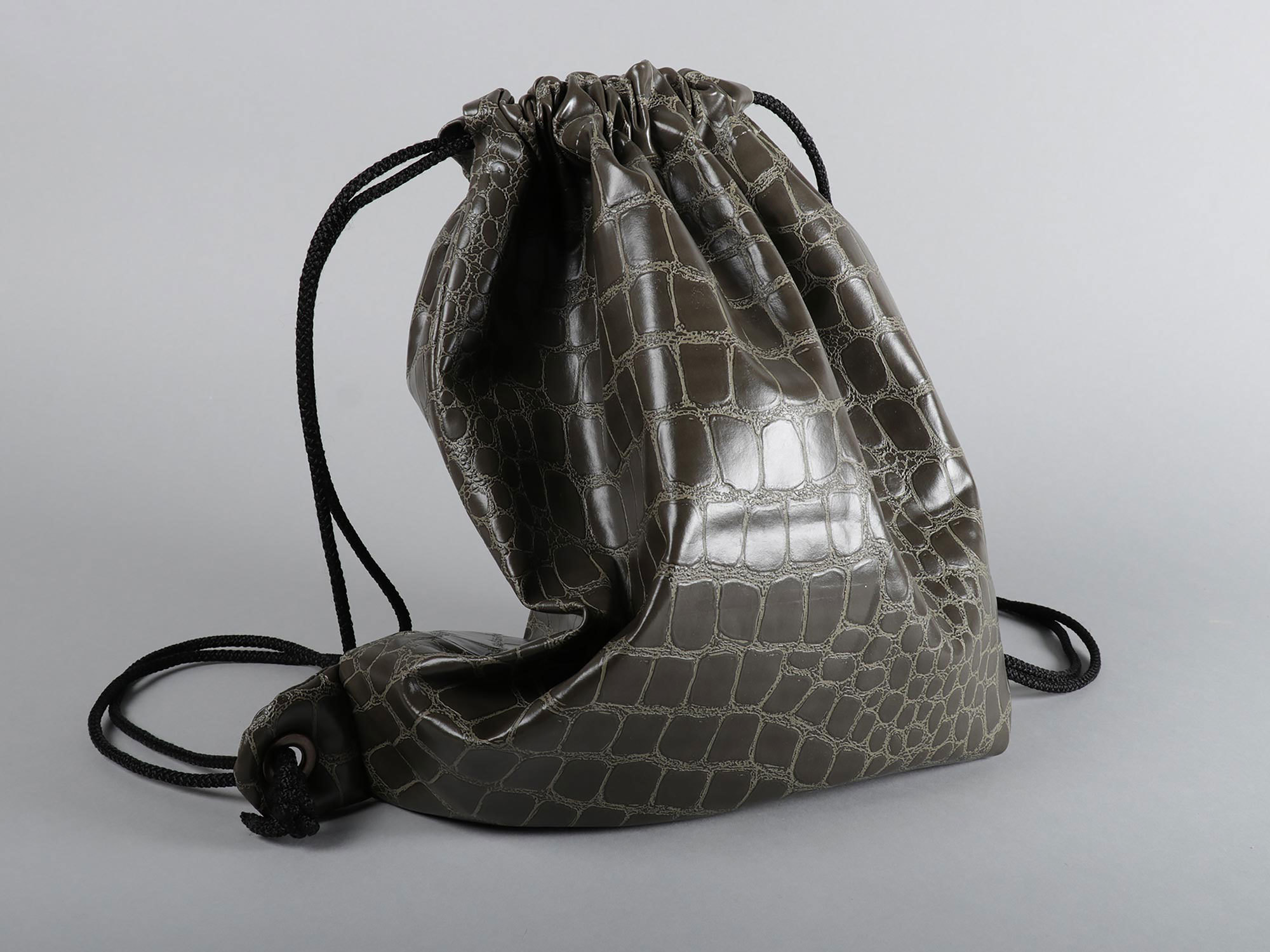A bag made from Vegan friendly materials resembling alligator skin