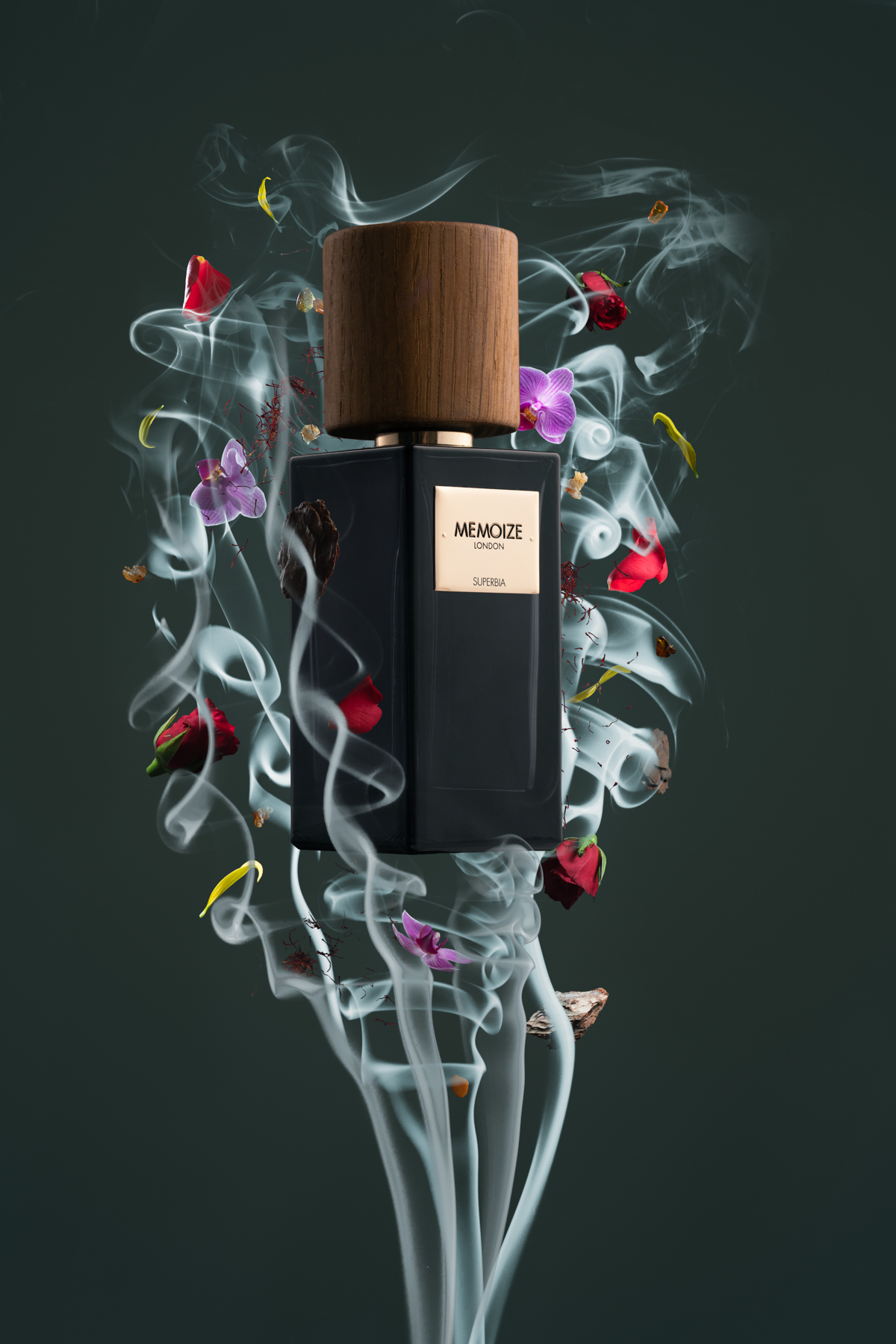 A perfume bottle surrounded by smoke and flower petals.