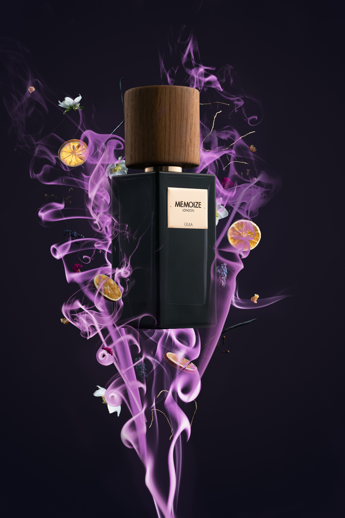 A perfume bottle surrounded by smoke and citrus slices.