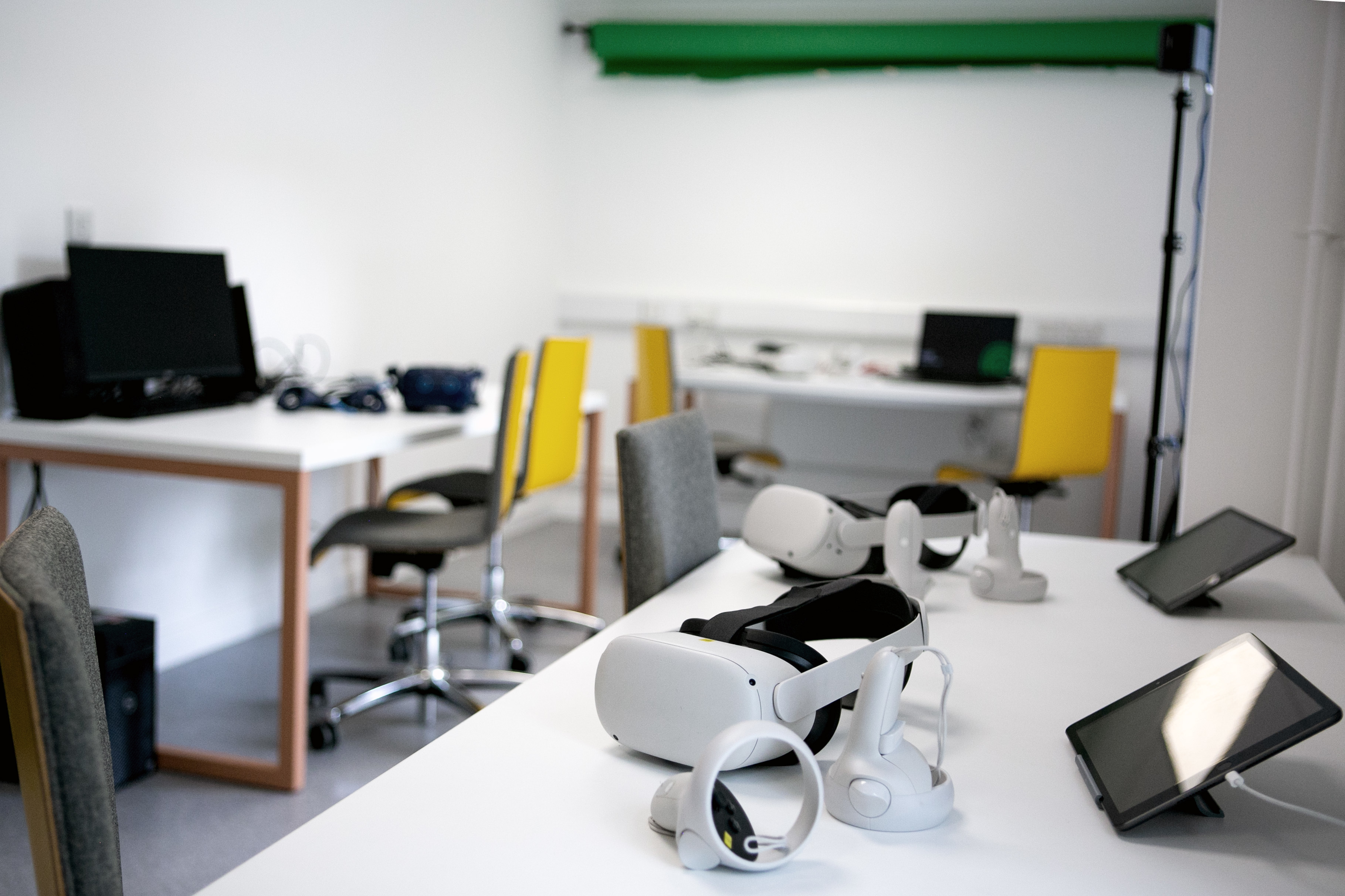 Virtual Reality kit out on the desk in a classroom.