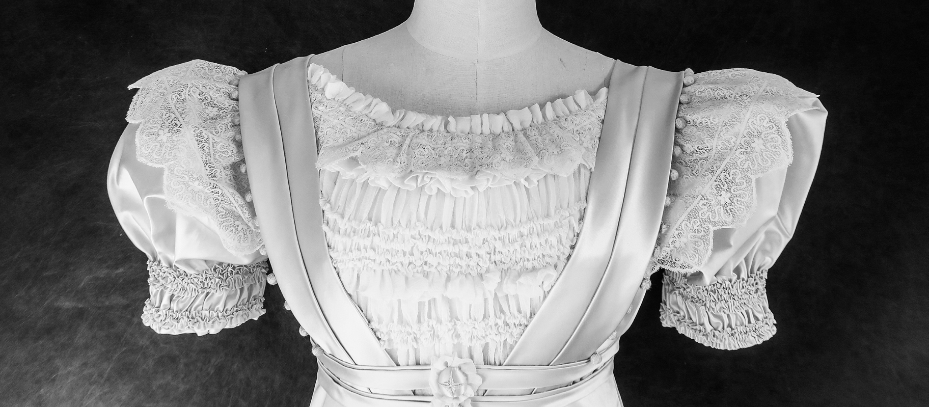 Black and white photograph of a blouse on a mannequin