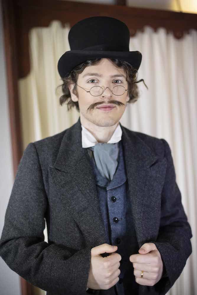 Portrait of an actor in Victorian costume.
