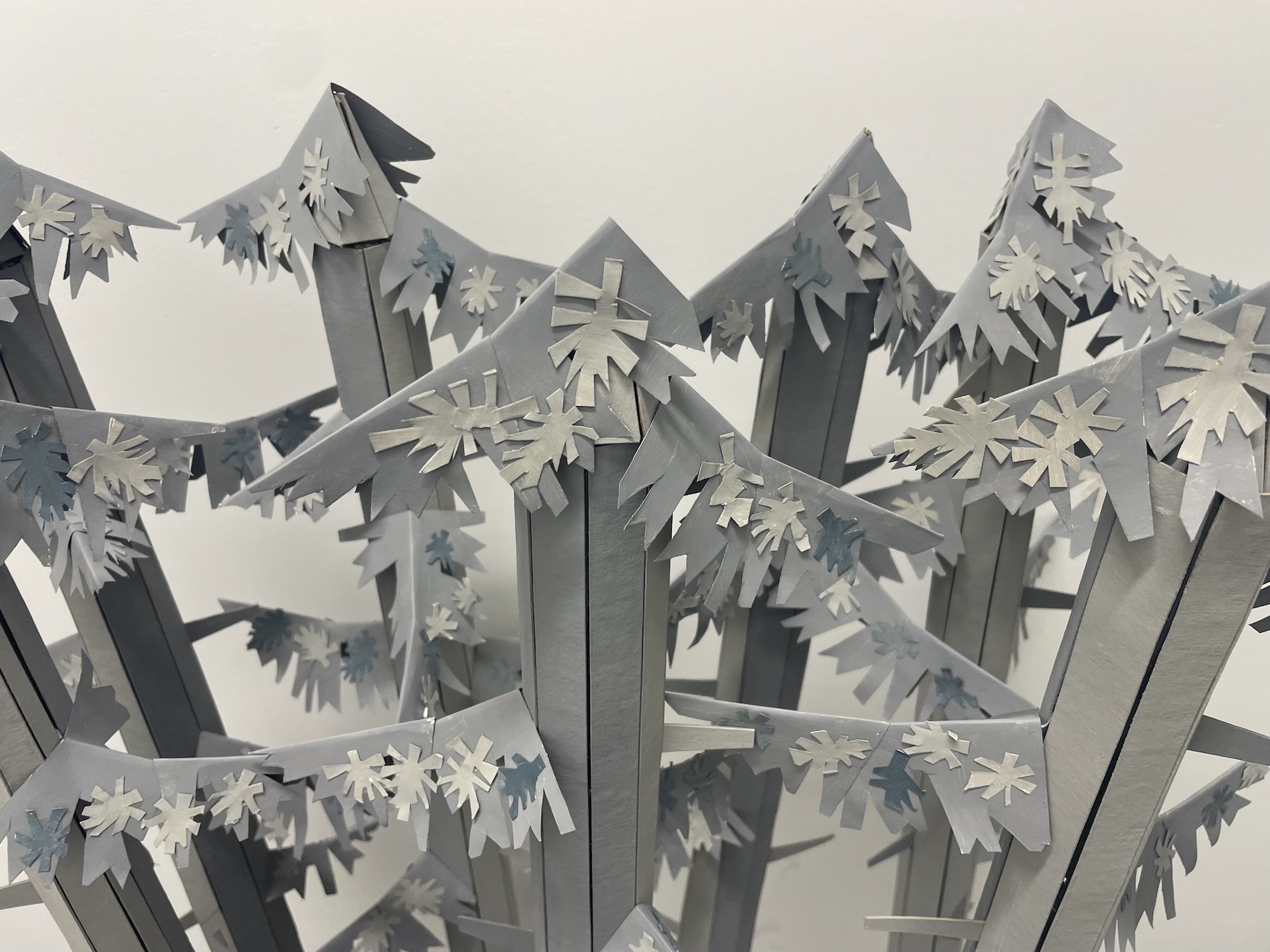 Grey 3D models of trees.