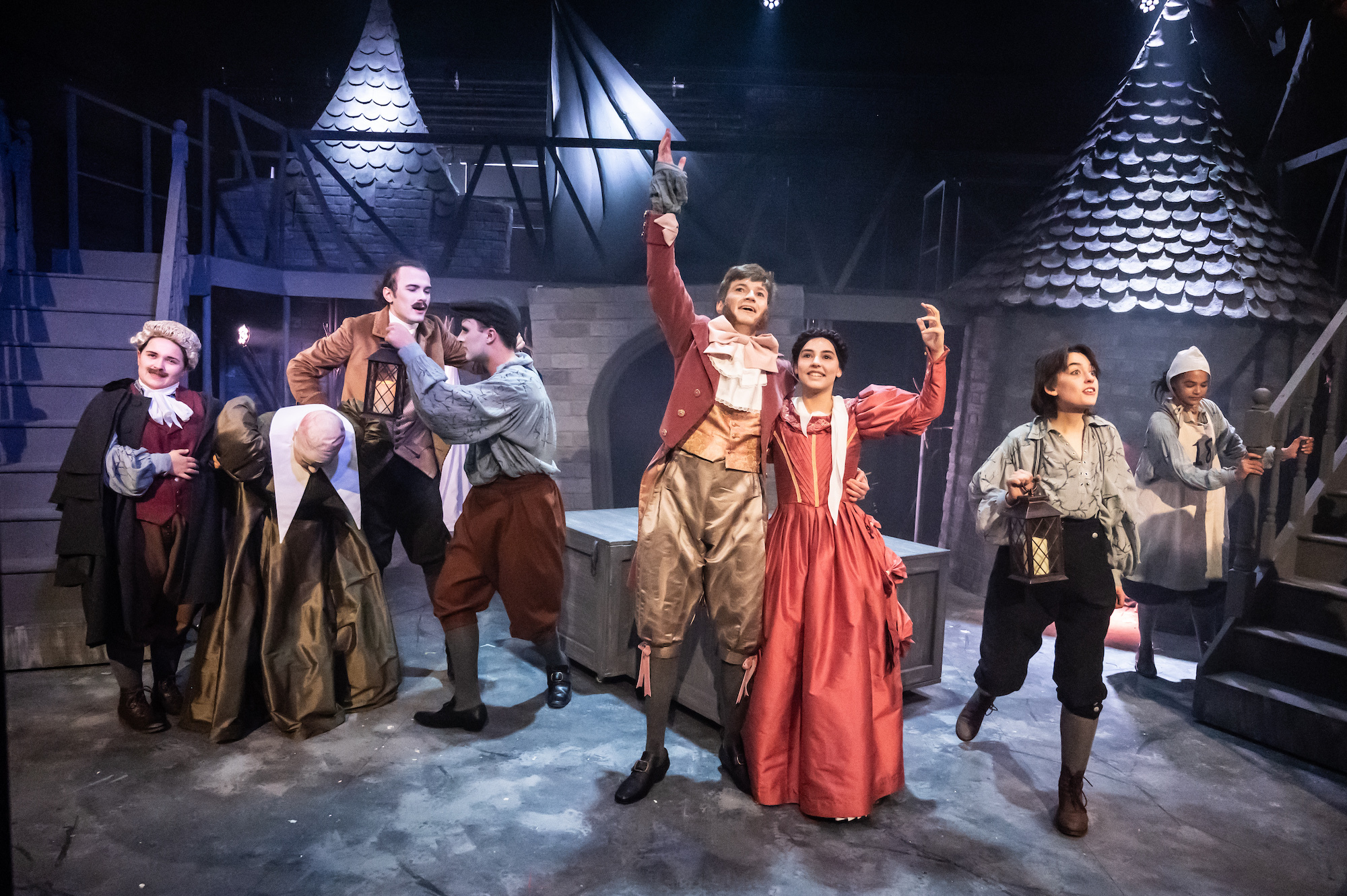 Several BA (Hons) Acting students on stage during a performance of "The Wolves of Willoughby Chase".