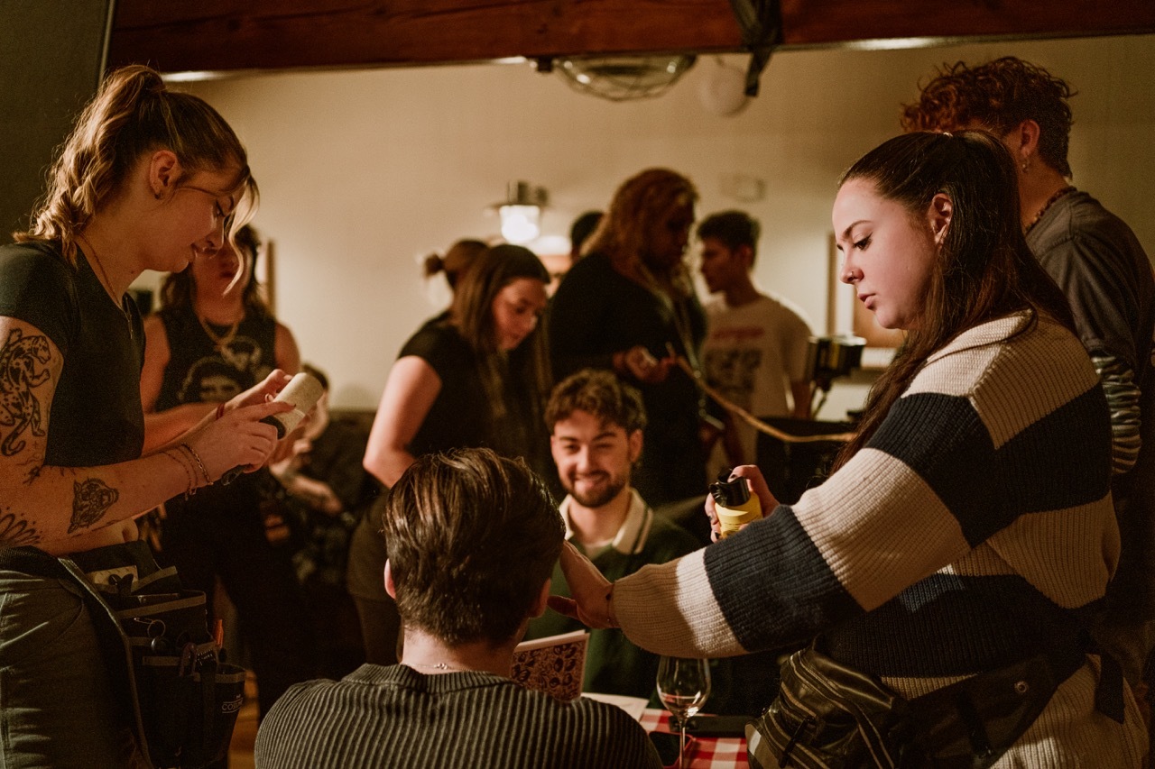 'You Free Tonight' BTS shot, MUAs working with actors.