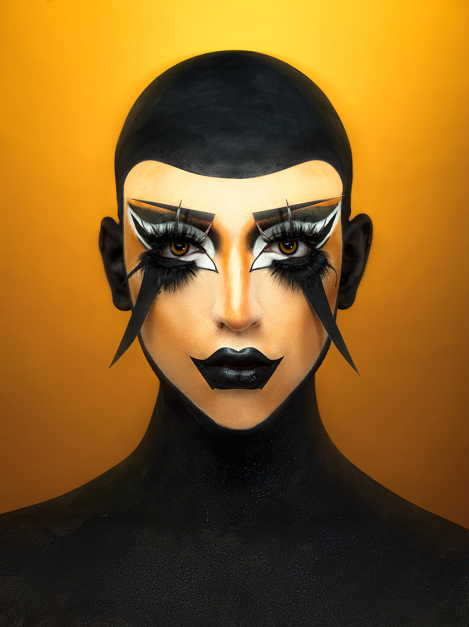 Yellow and black make-up on model