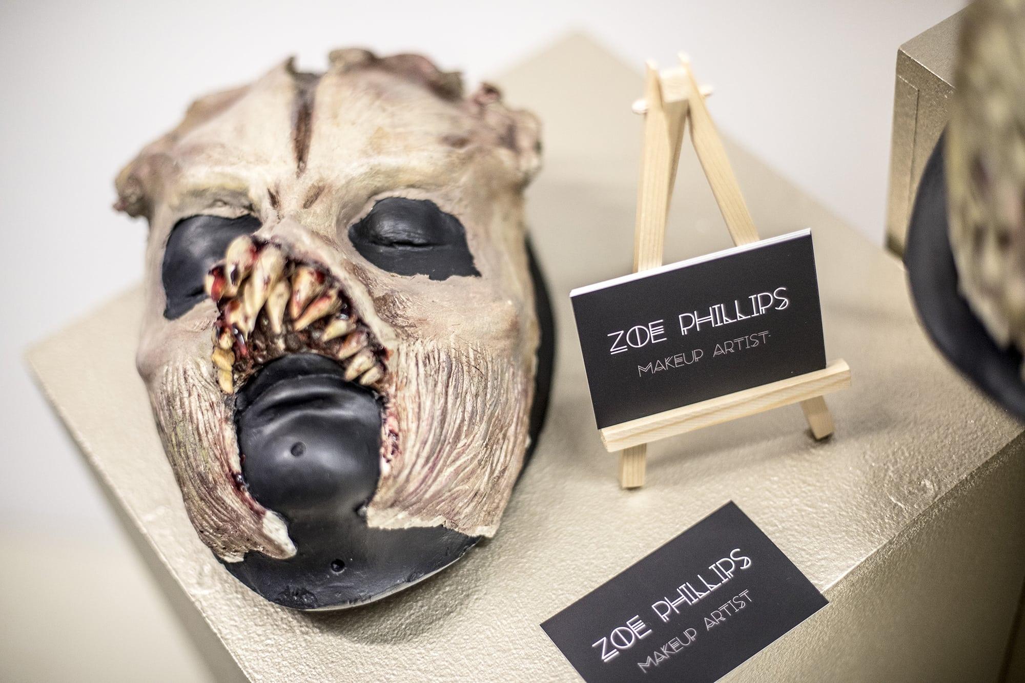 Alien prosthetics with teeth on a face mannequin.