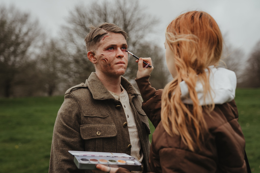 Final checks on set with BA (Hons) Acting student Elliot Cox