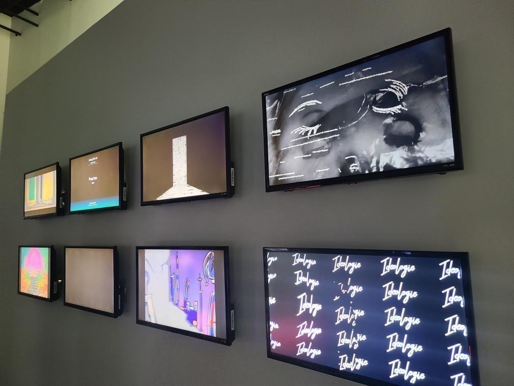 Arezou Ramezani's art on display on TV screens in a Seoul art gallery
