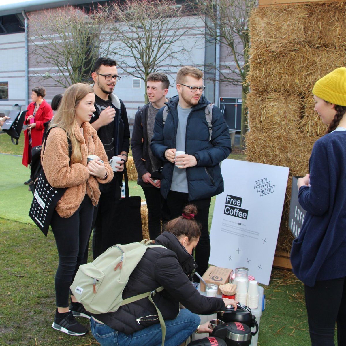 Student's handing out free coffees