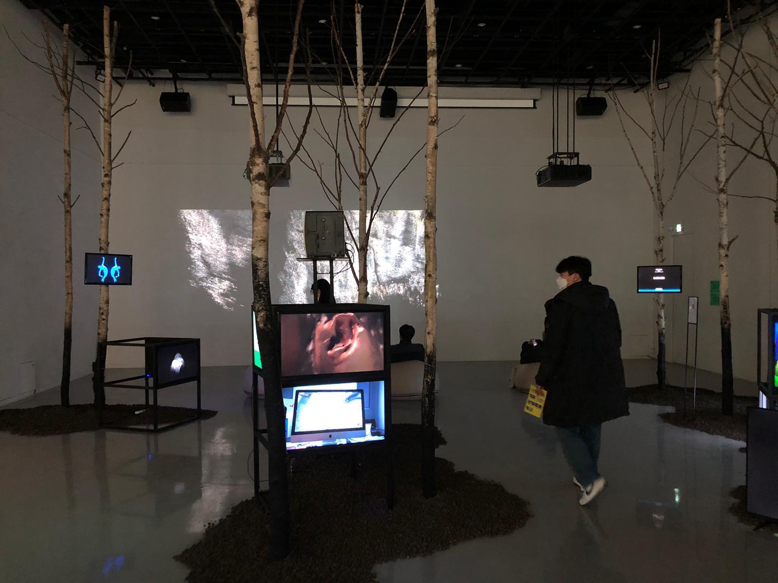 Inside a darkened art exhibition