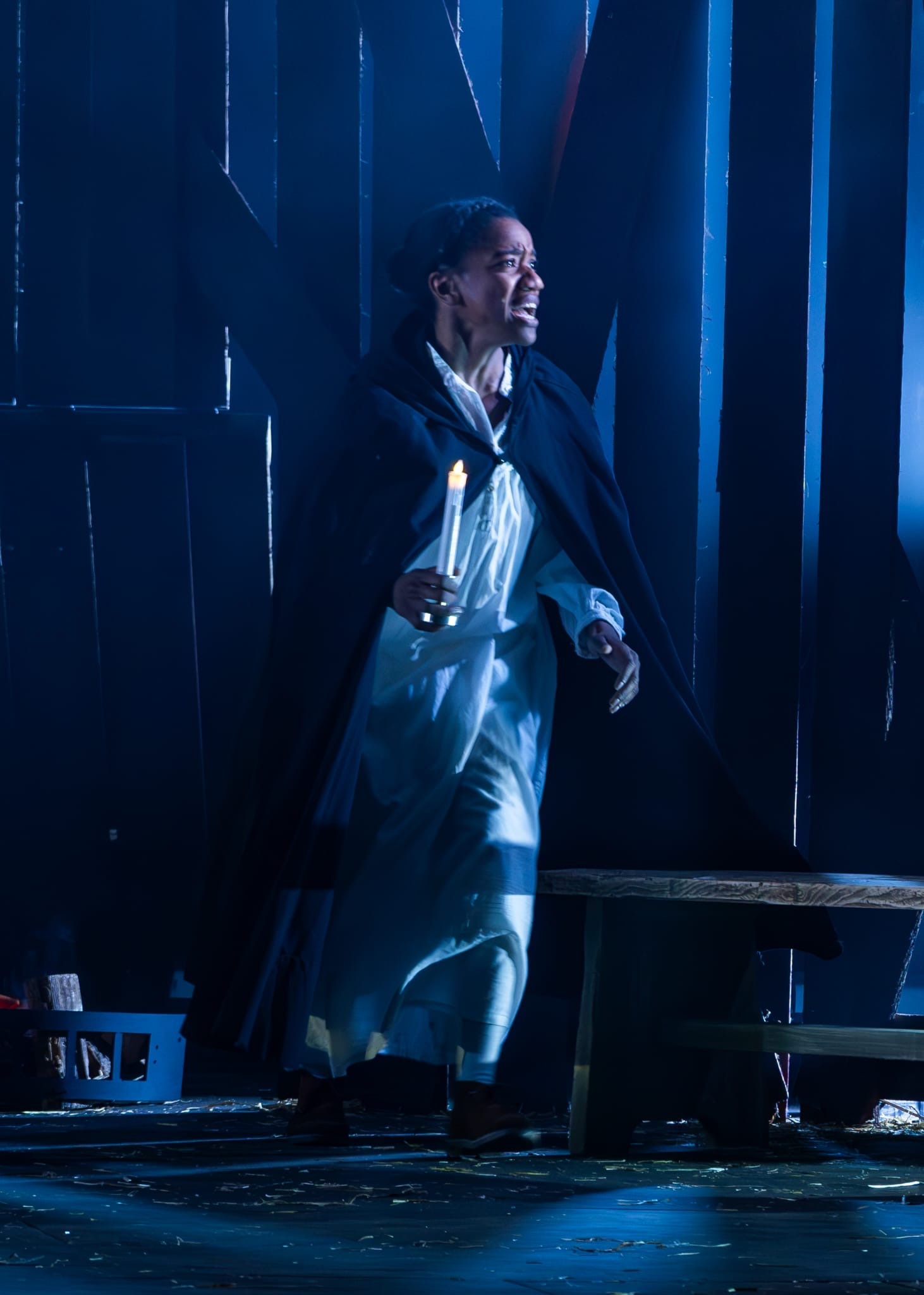 Nicole Elizabeth Phillip in The Ballad of Maria Marten, blue lighting.