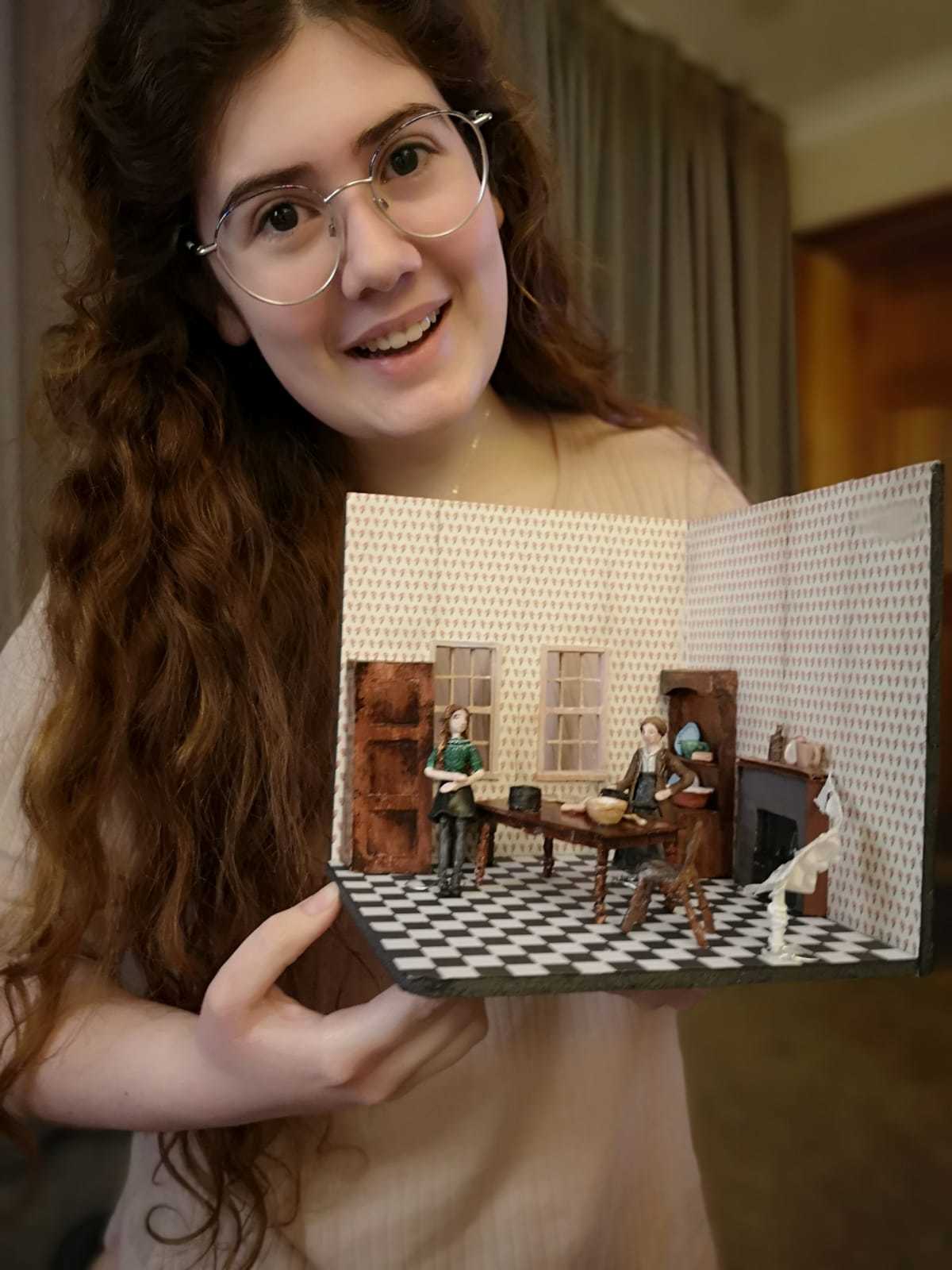 Verity Joy with her work at AUB