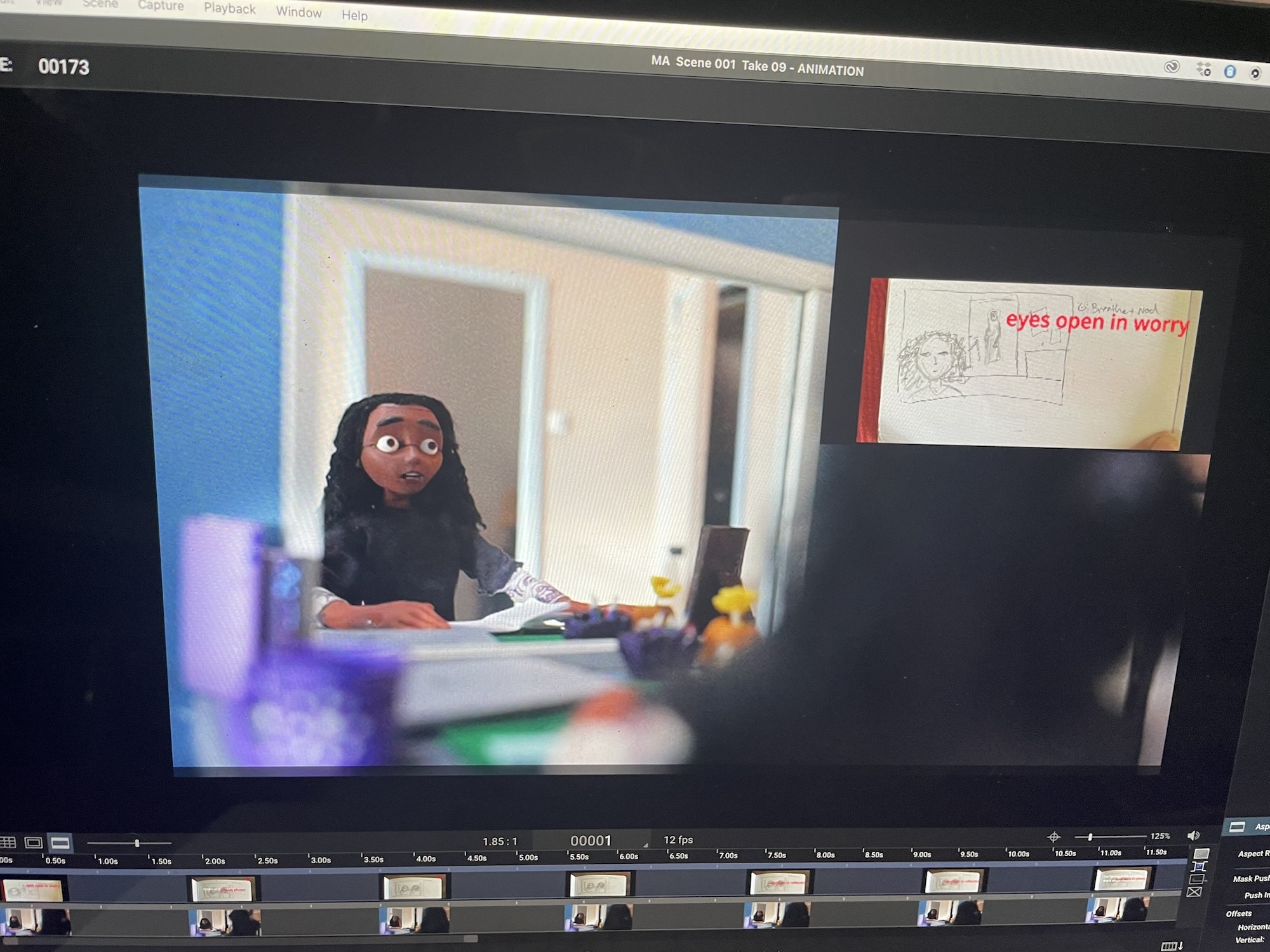 Screenshot of a piece of film or animation software, showing an animated character with a surprised expression on their face on the screen.