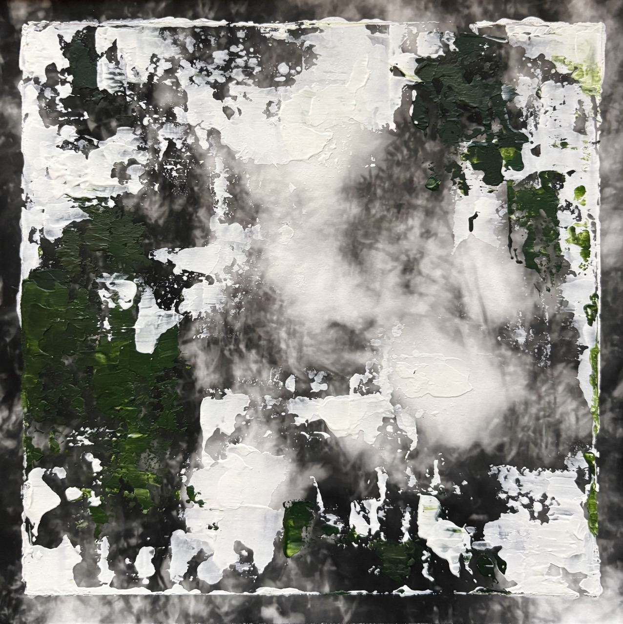An abstract mixed-media artwork with black, white and dark green paint layered in a rough square composition.