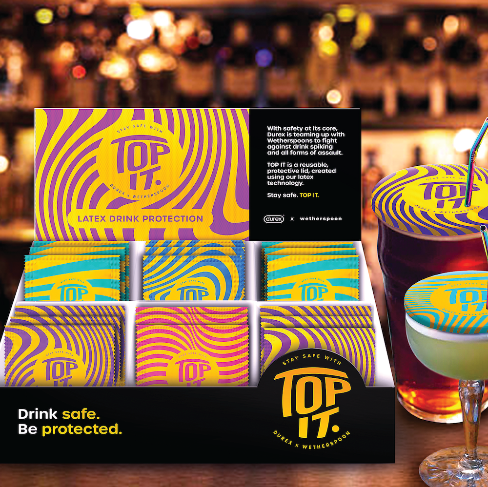 A promotional poster for a product called Top It. The poster shows a point of sale and six varieties of packaging for the product.