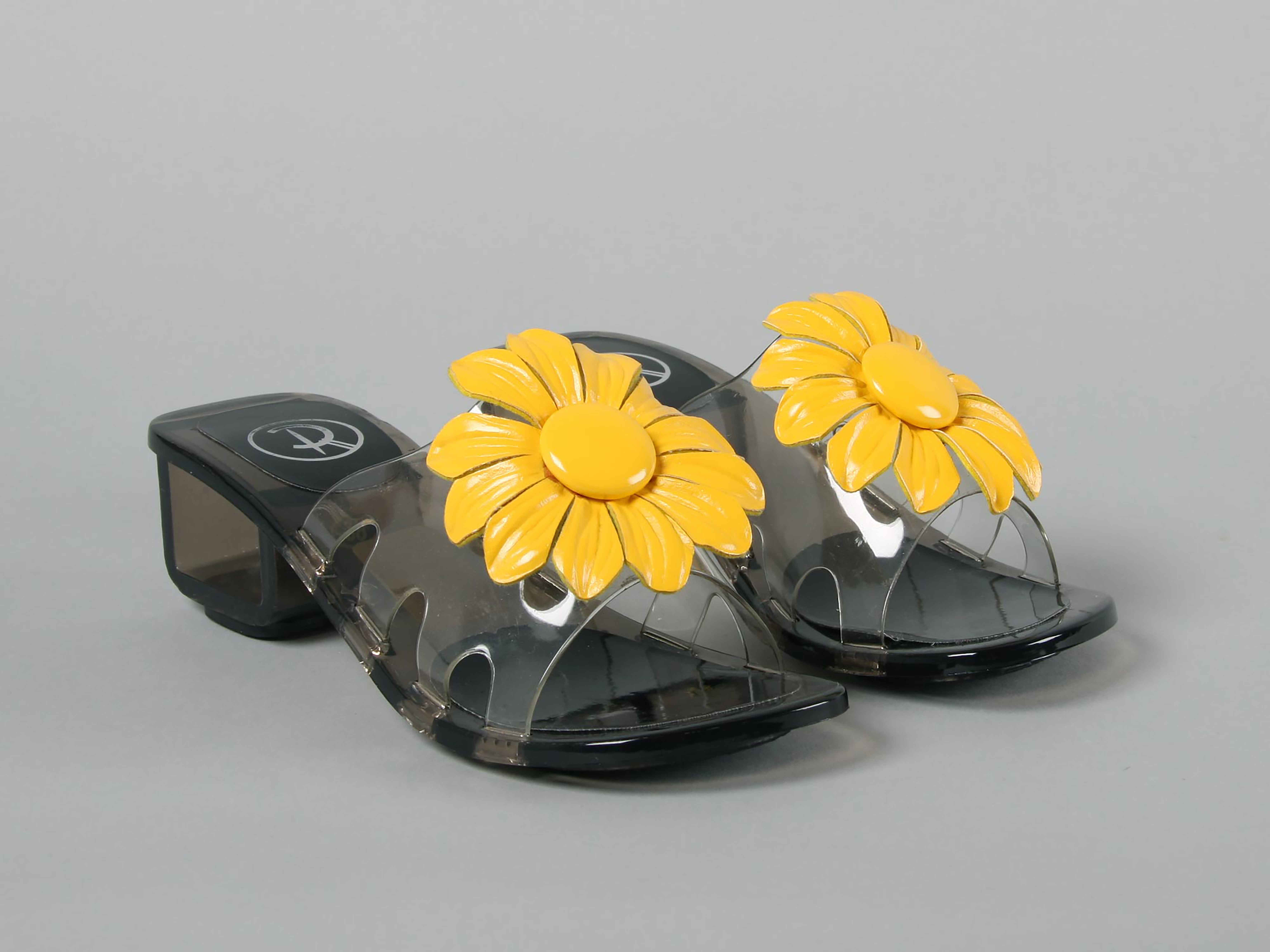 Shoes with sunflowers on them