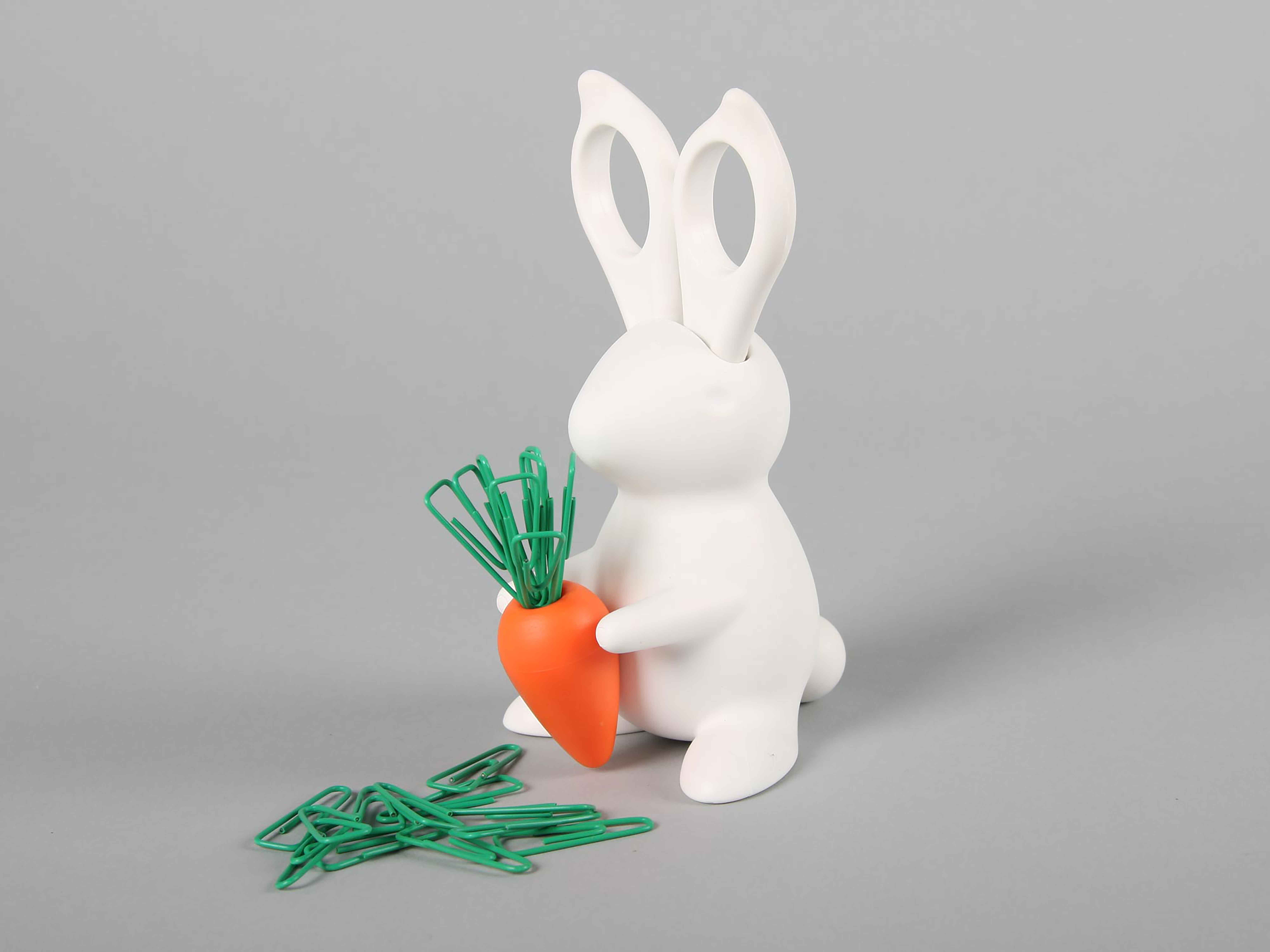 A Toy rabbit holding a carrot