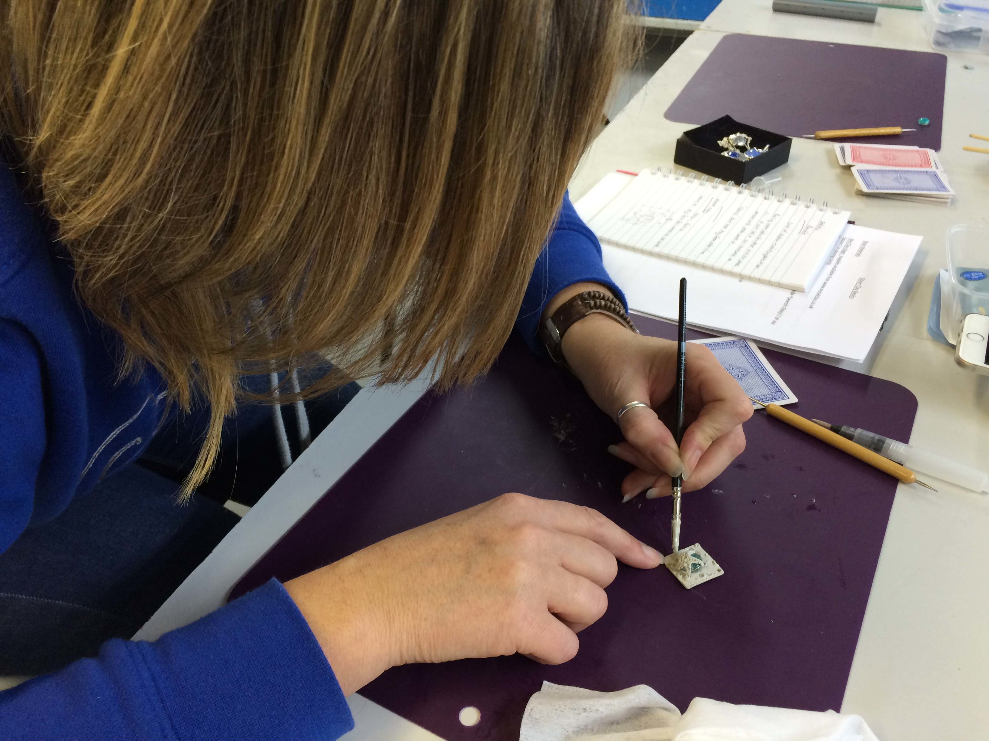 Student working with silver clay