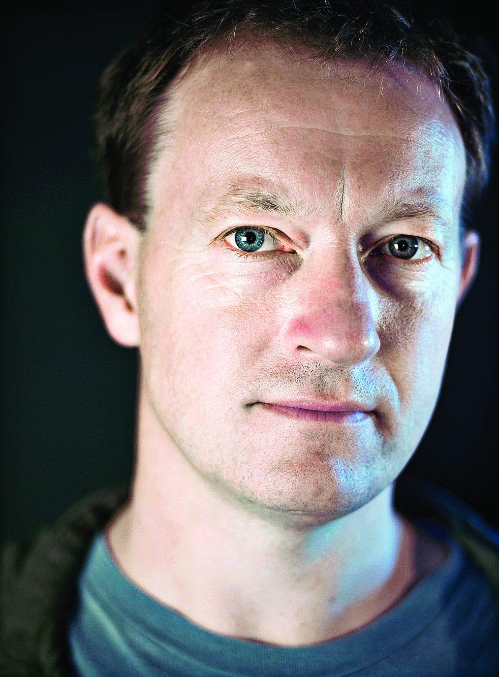 Headshot of S Beaufoy.