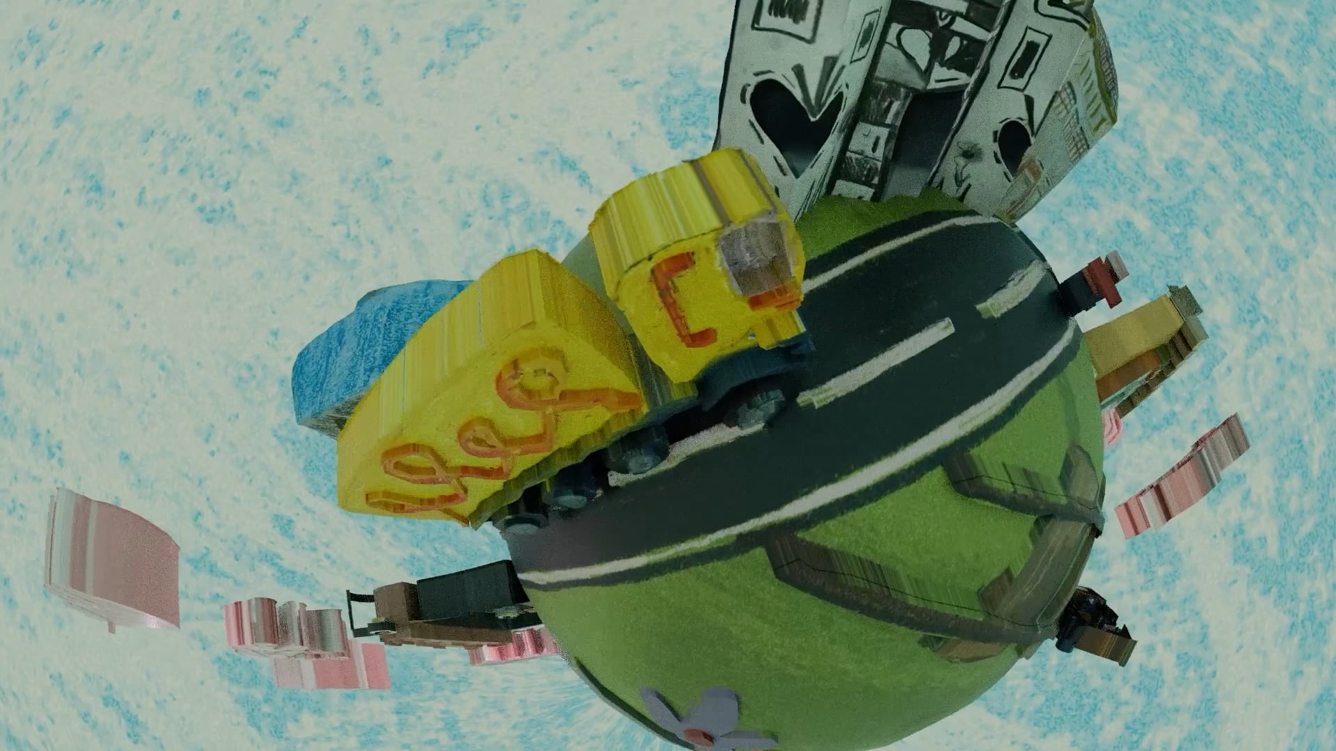 A stylised miniature planet with yellow and green buildings attached to it, set against a pale blue sky-like background.