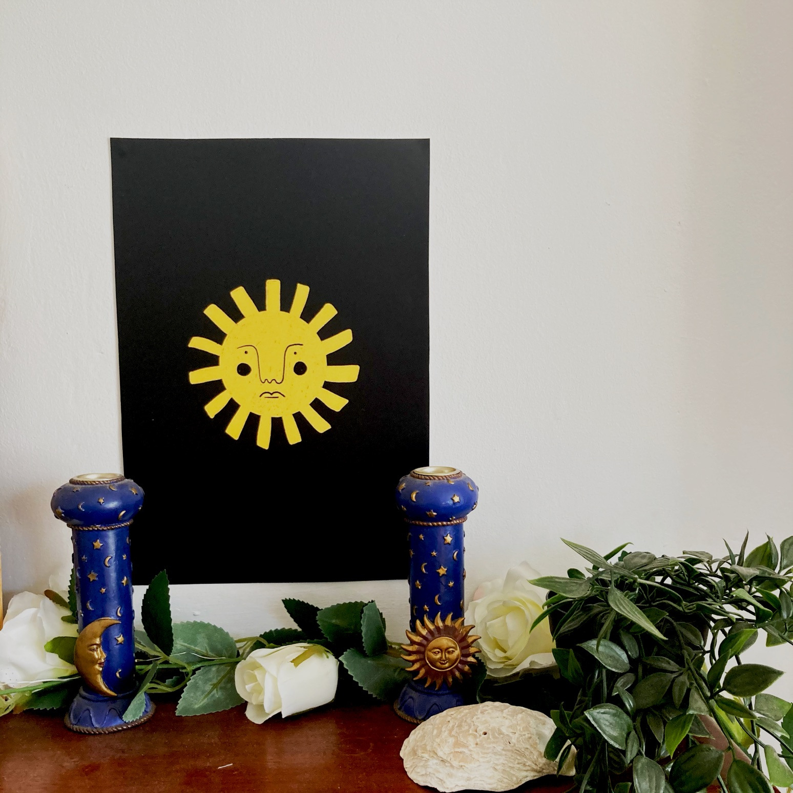 Print of a sun on a black background
