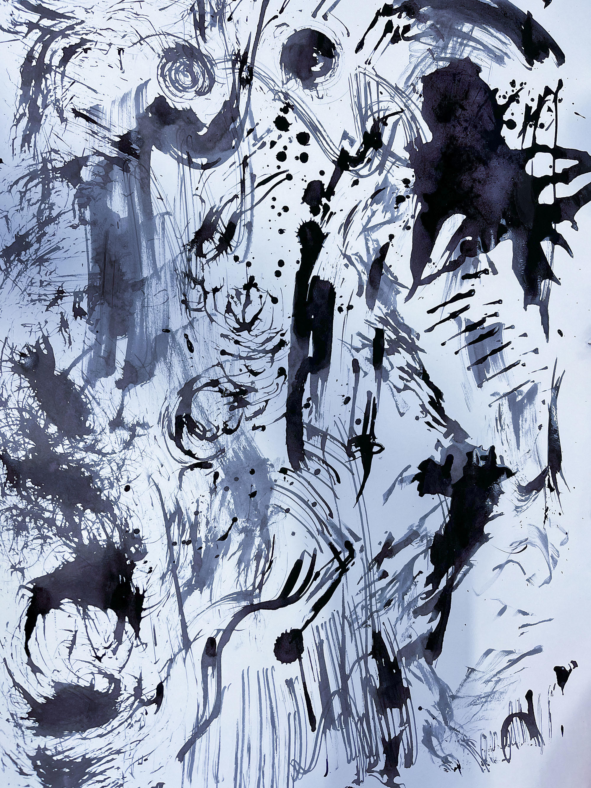 Various shapes and figures in black and grey paint