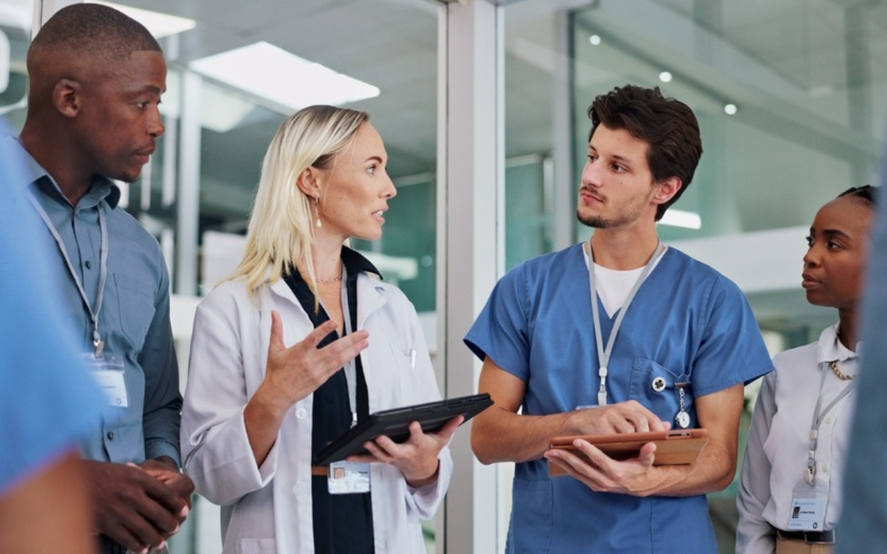 Group of medical professionals working together to demonstrate medical workforce culture