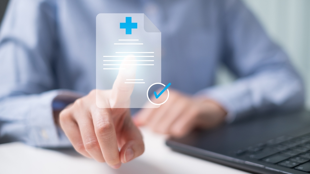 A doctor providing a medical certificate to patient
