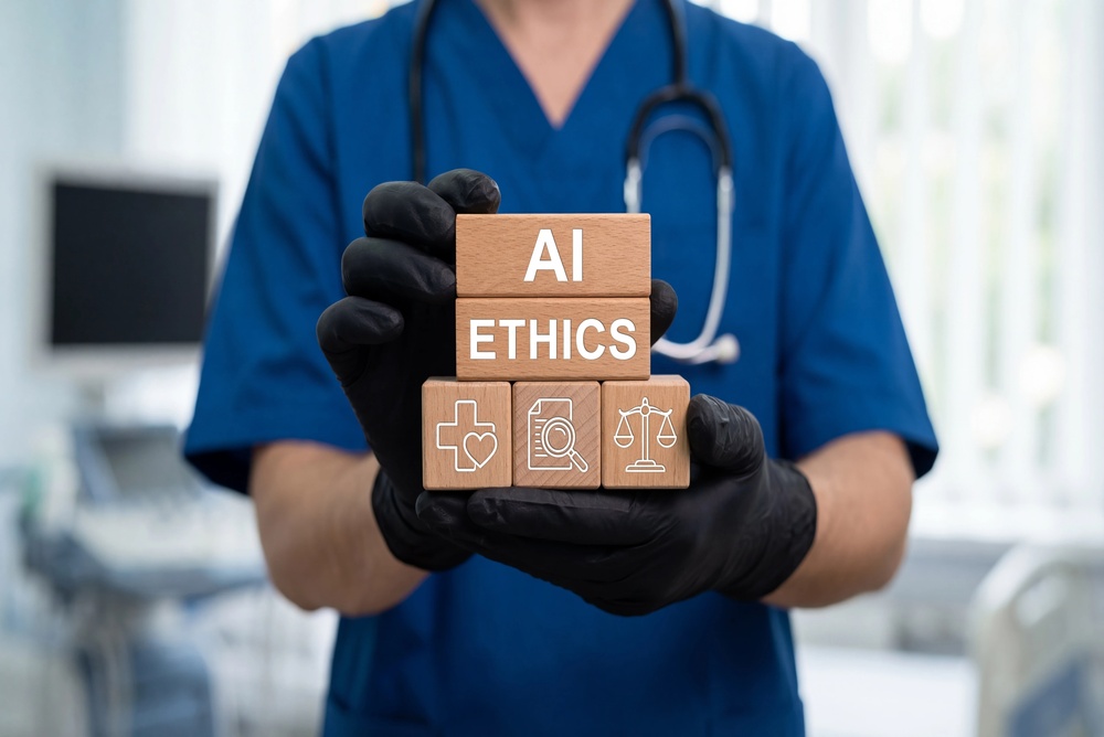 A doctor in scrubs holds blocks with the words "AI Ethics" printed on them