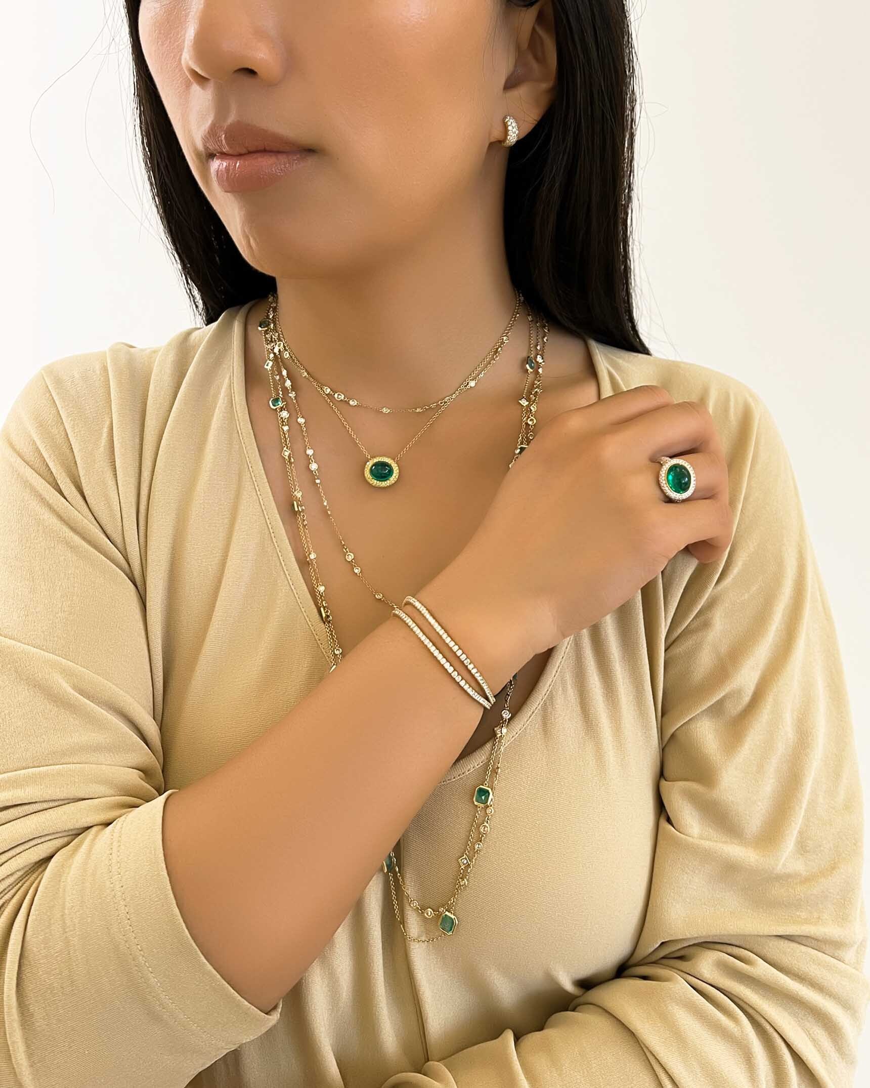 Emerald and Diamond Yellow Gold Earrings_Necklaces_Rings and Bracelets EDF5K06610 - NCOTK01651 - PNC6K01919 - NDOTK05005 - RCDEM01018 - BDUTK01508 - BDUTK01517