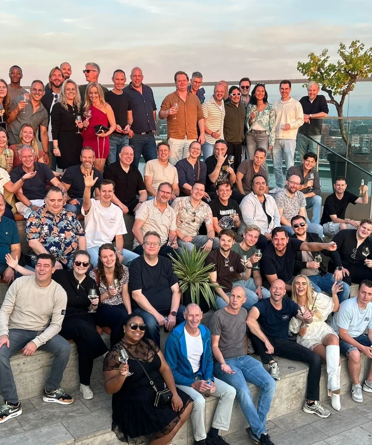 Group photo of the Digital Survival Company team on a rooftop