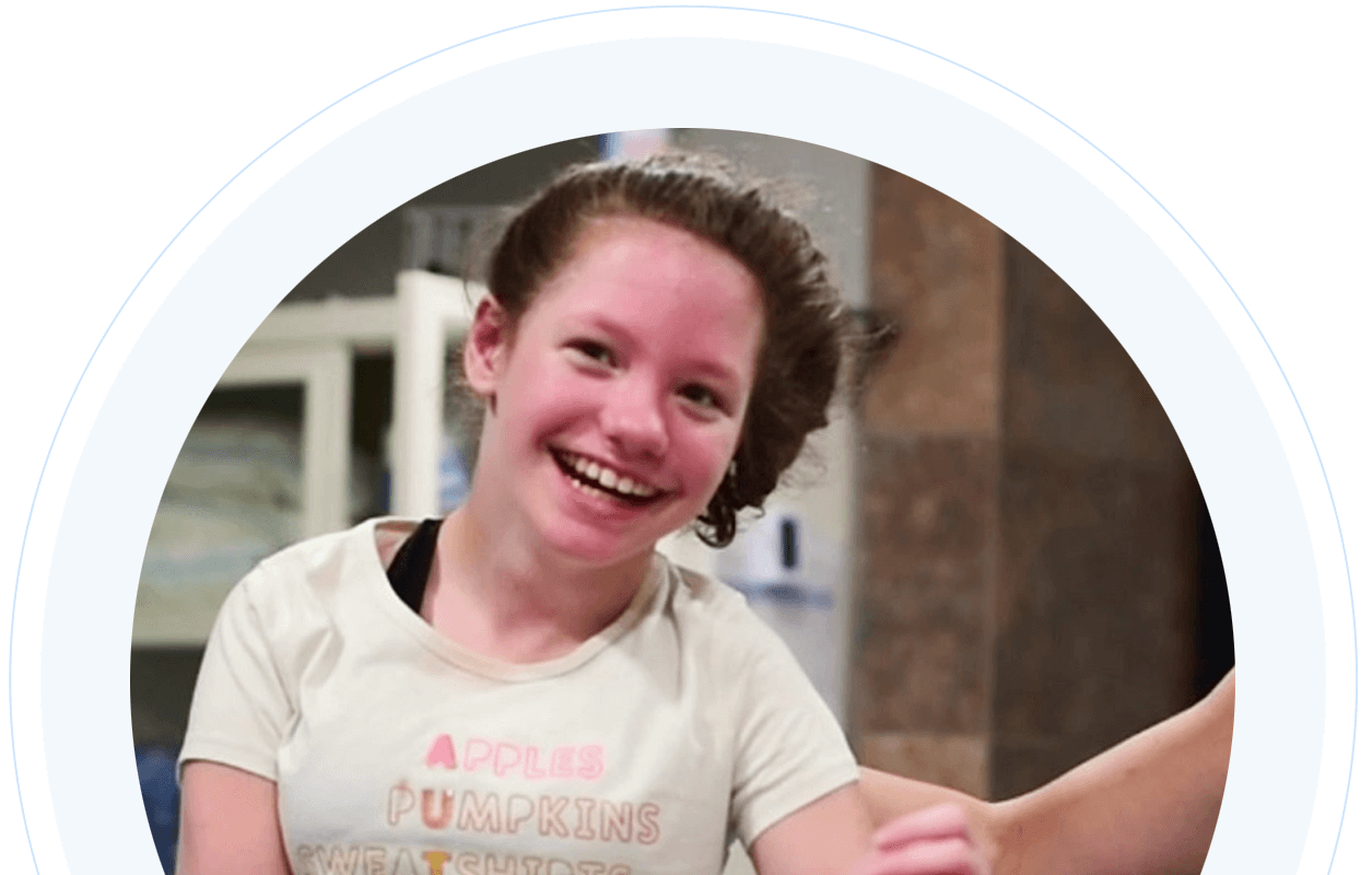 Teenage girl with cerebral palsy smiling