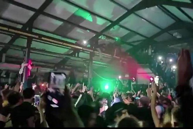 A woman was attacked by a police dog at an illegal Halloween rave
