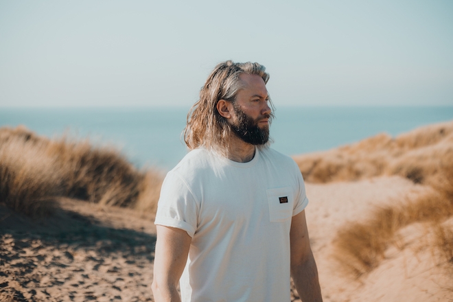 Tom Ashbrook proclaims 'We Begin' on new single
