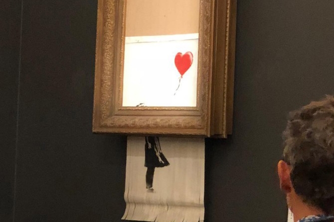 Iconic Banksy artwork sells for over £1 million, immediately self-destructs
