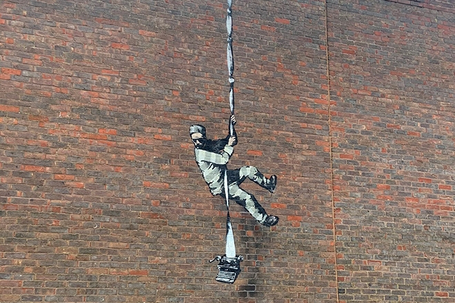 Banksy pledges to raise millions to transform Reading jail into art centre