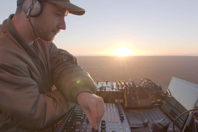 Basenji plays live sunrise set in hot air balloon
