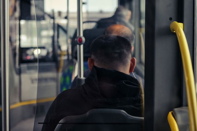 Bus passengers in England could be fined £100 for playing loud music