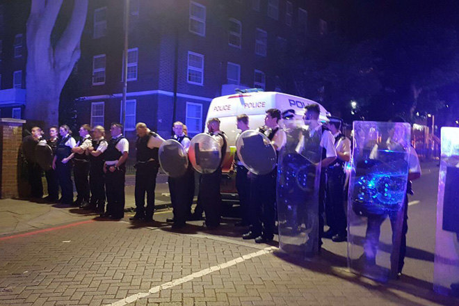 Riot police and ravers clashed at an "illegal" party in North London