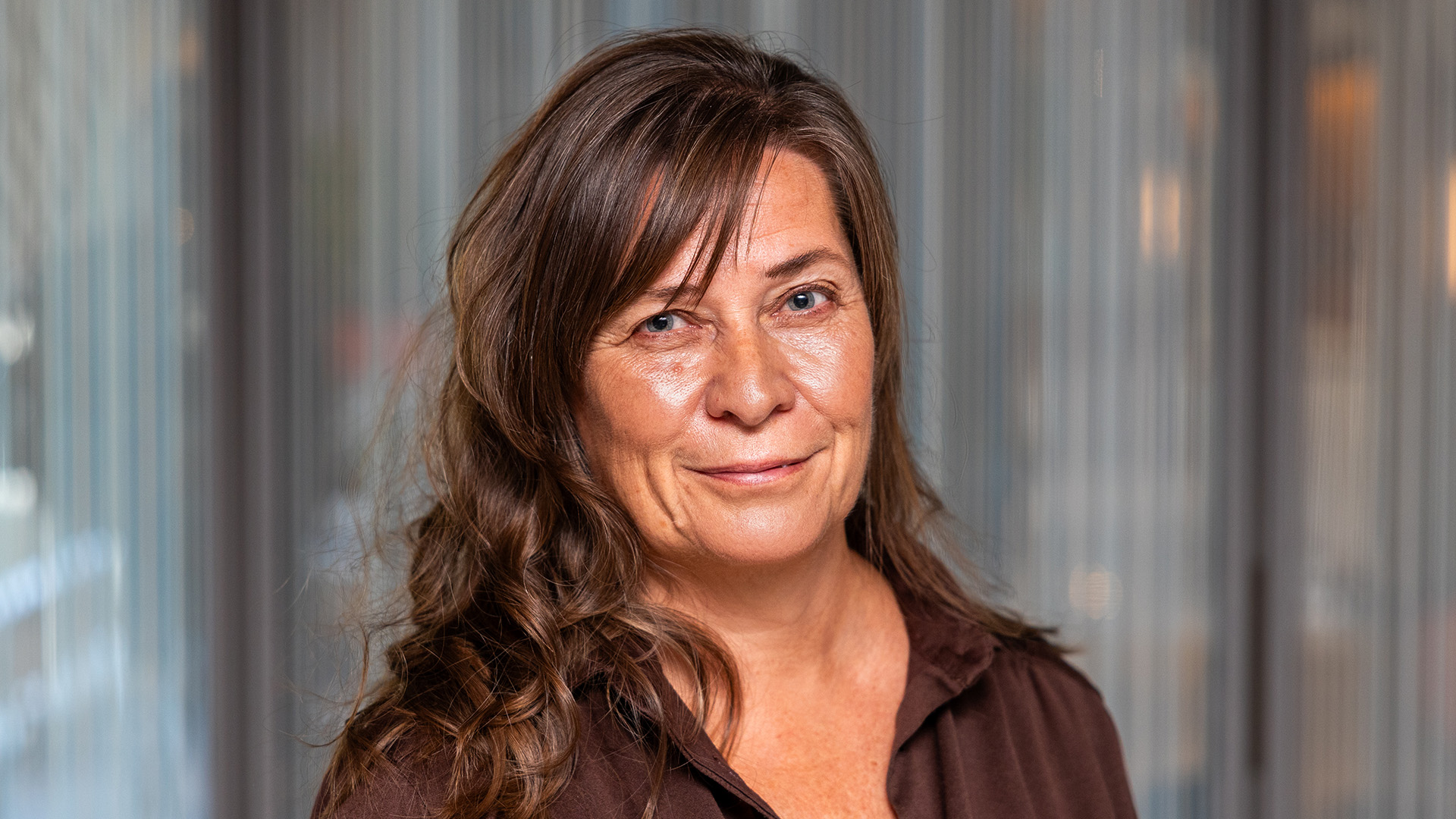Foto. Kvinne smiler