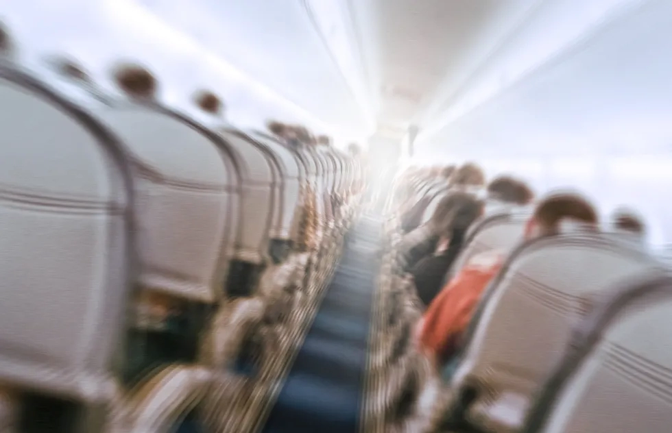 Blurry_Airplane_Cabin.webp