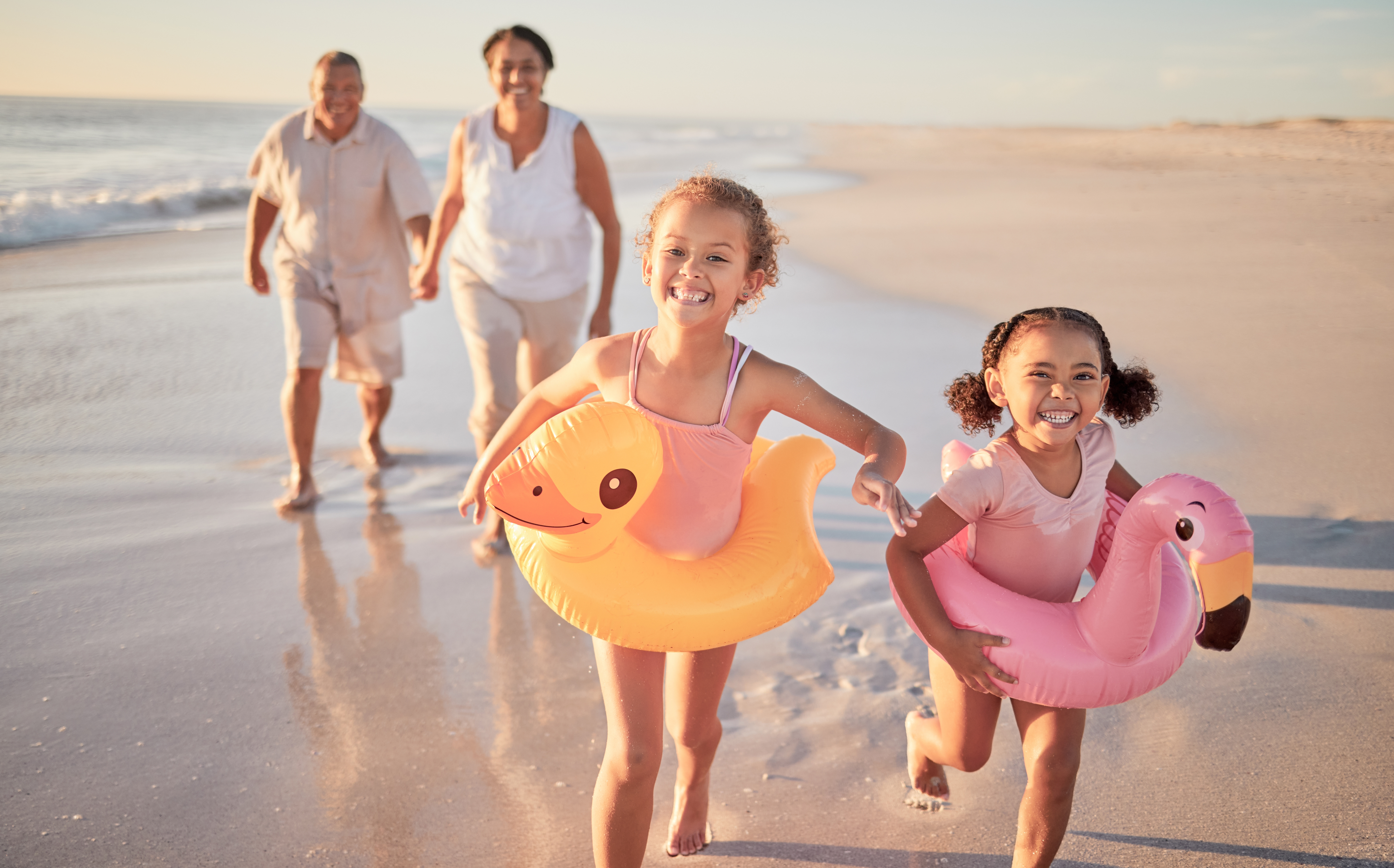 Grandparents and grandkids on a beach