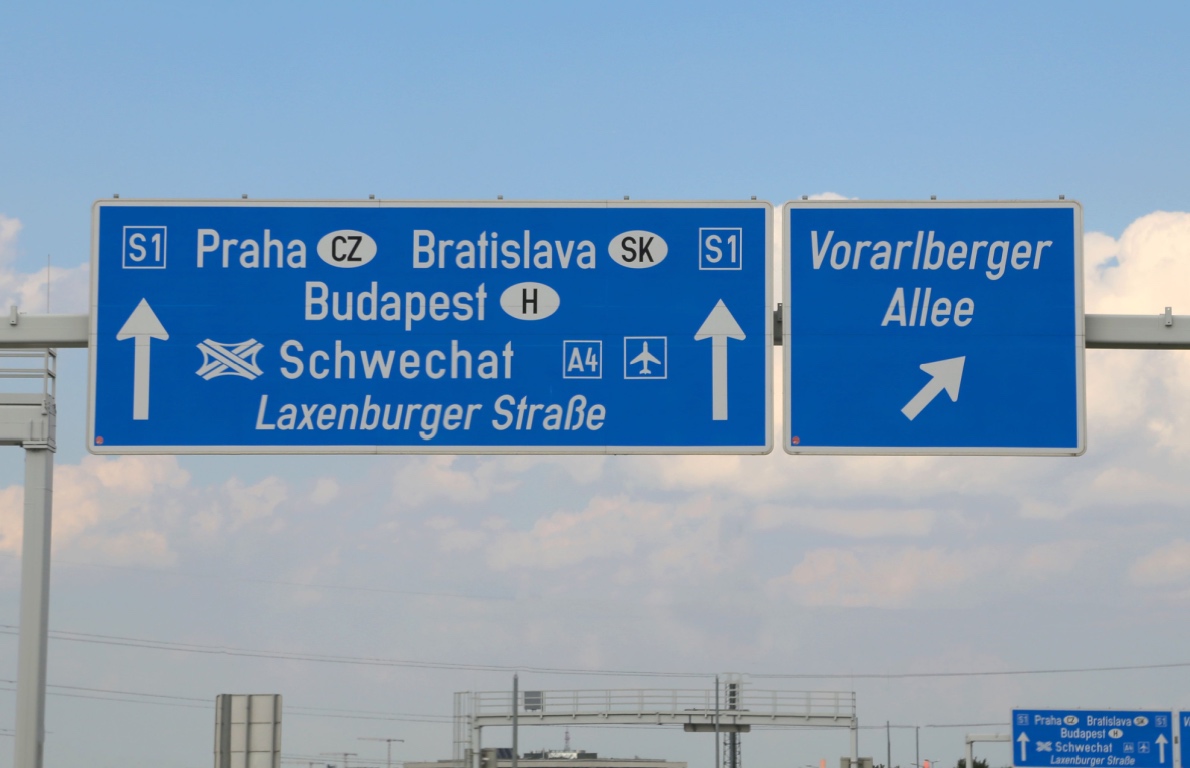 European directional highway signs for Prague, Budapest, and Bratislava