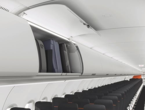 It's Happening! Airline to Start Charging for Use of Overhead Bins