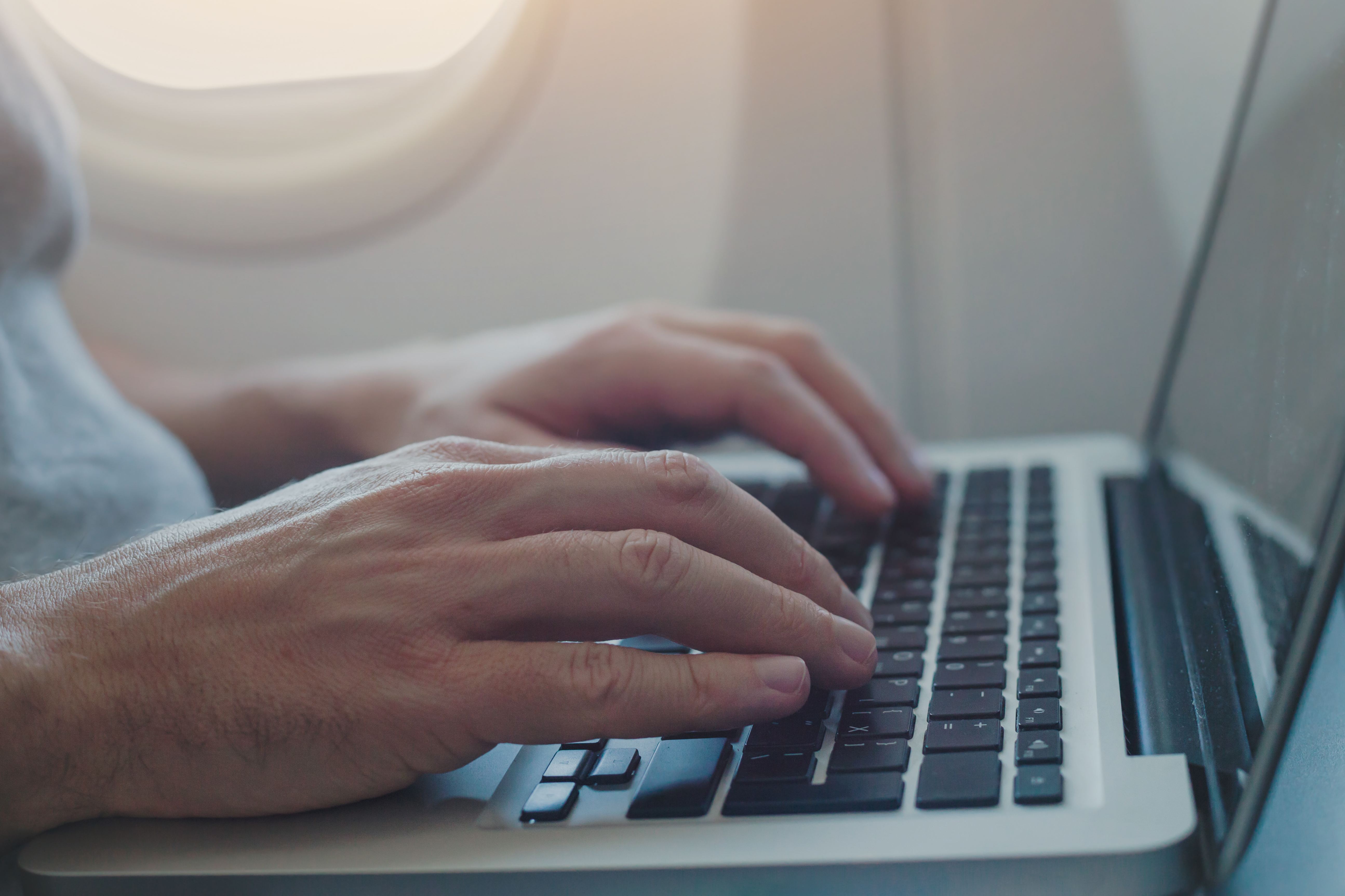 Using a laptop on an airplane