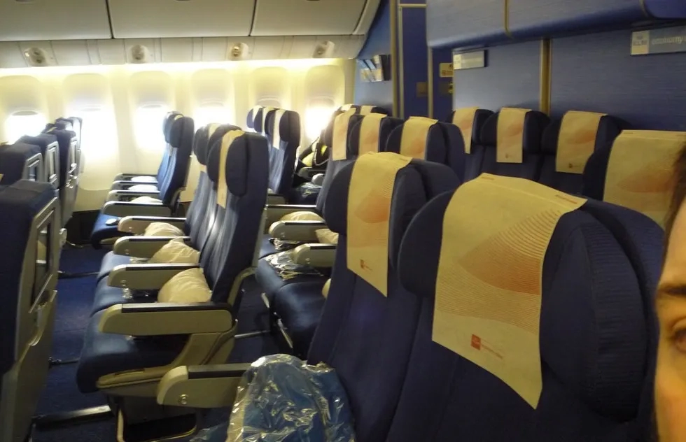 Empty seats on empty flight in coach
