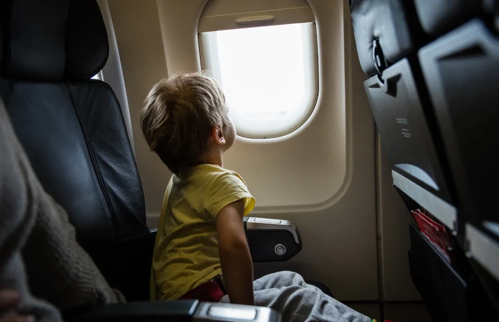 Kid on an airplane