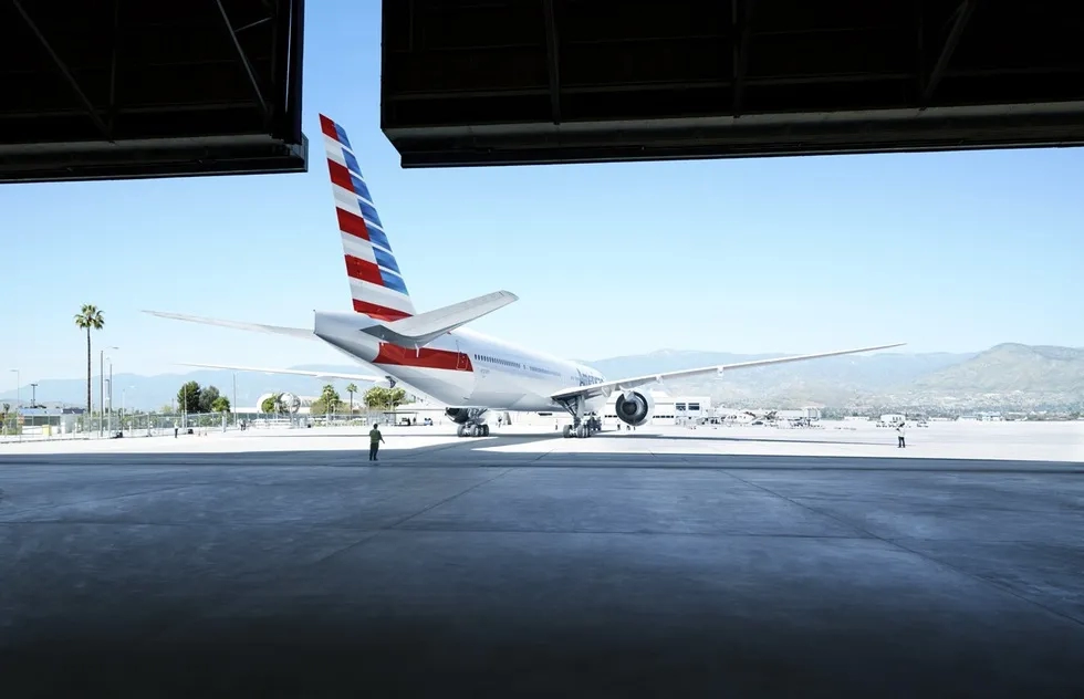 American Airlines jet at airport hangar