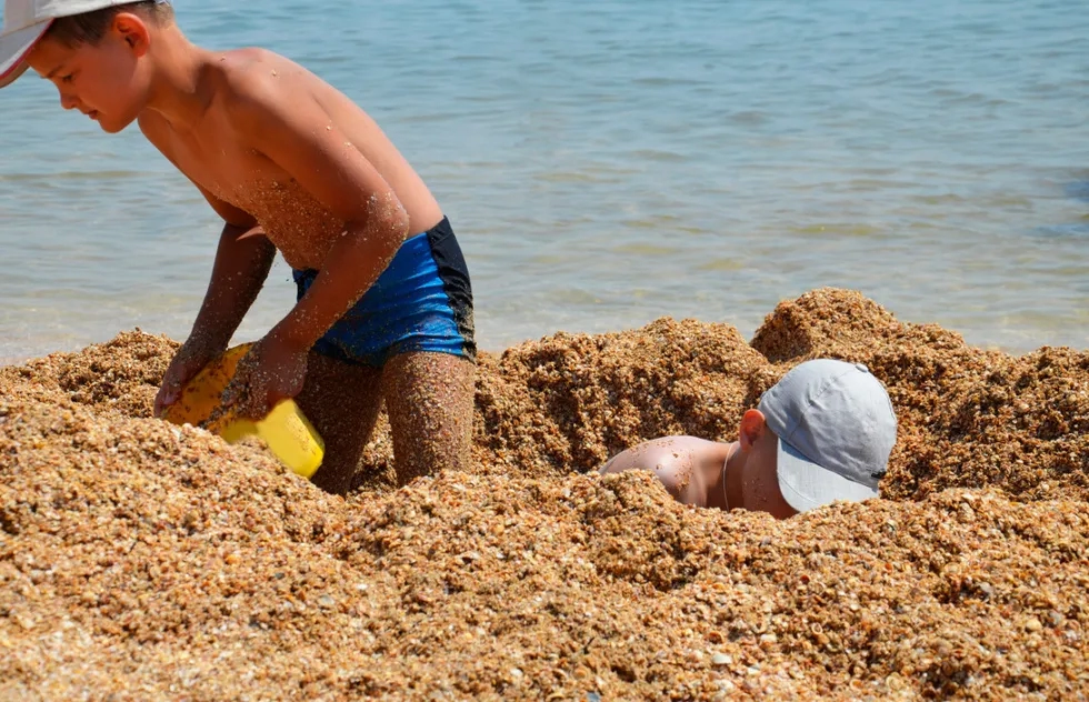Digging a hole at the beach